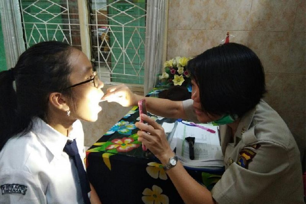 Health Promoting School : Program Pemeriksaan THT